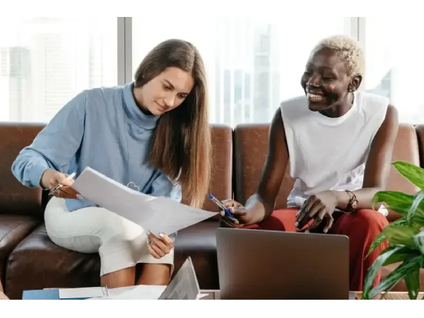 two women reviewing documents