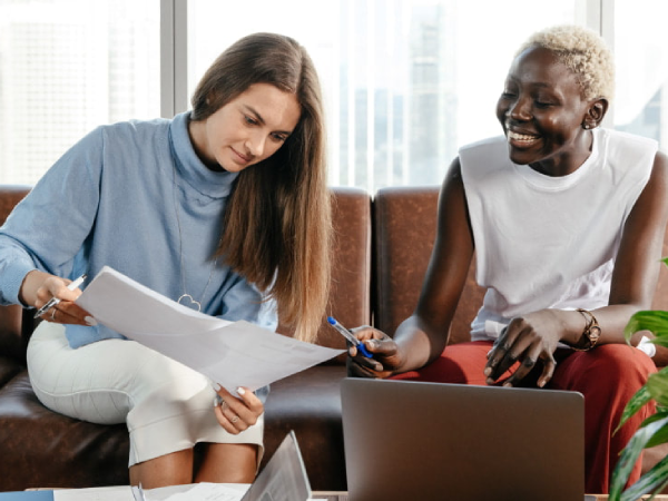 two women reviewing documents (1)